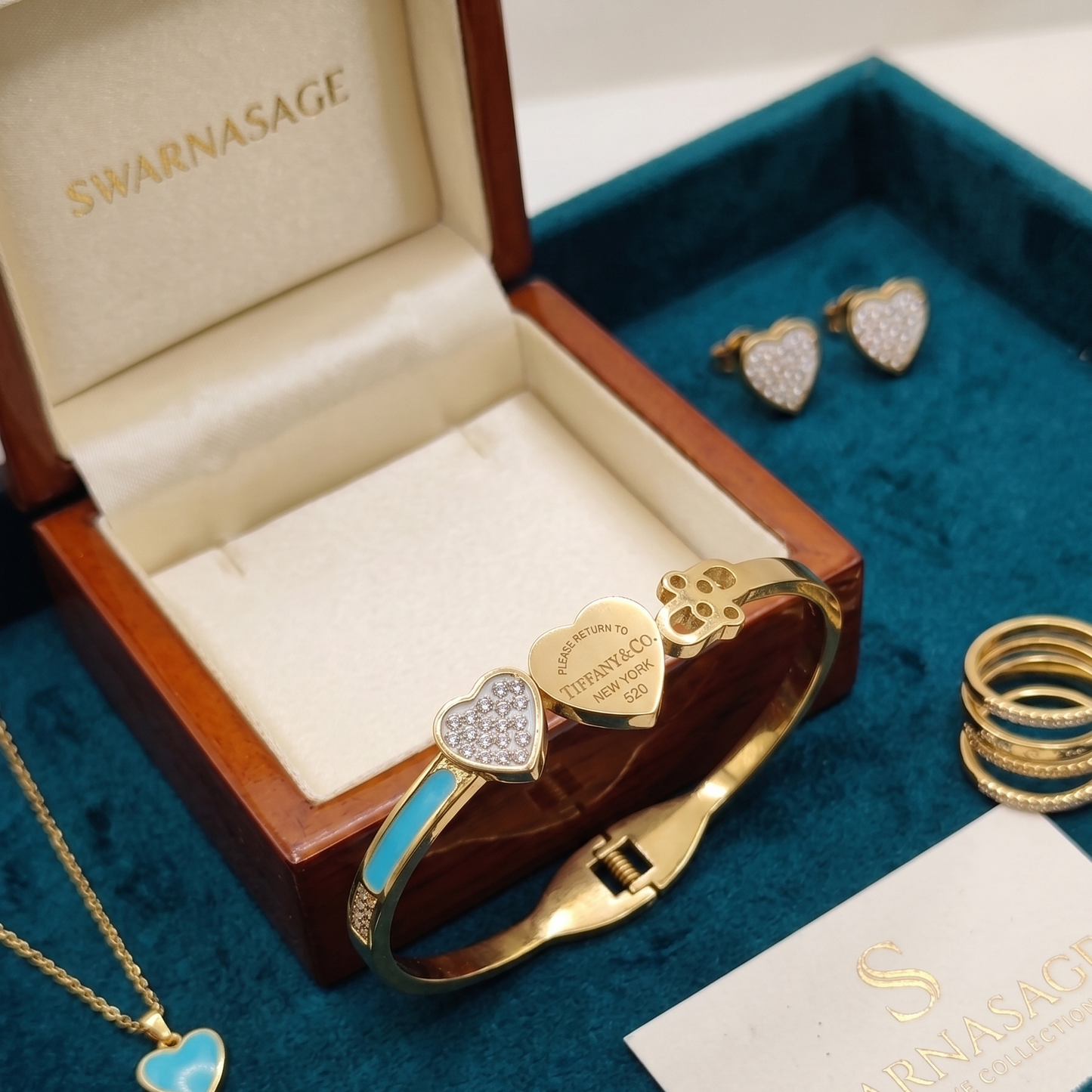 Tiffany Style Two-Heart Hinged Bangle: Pave Heart, Gold-Tone Heart, and Turquoise Enamel