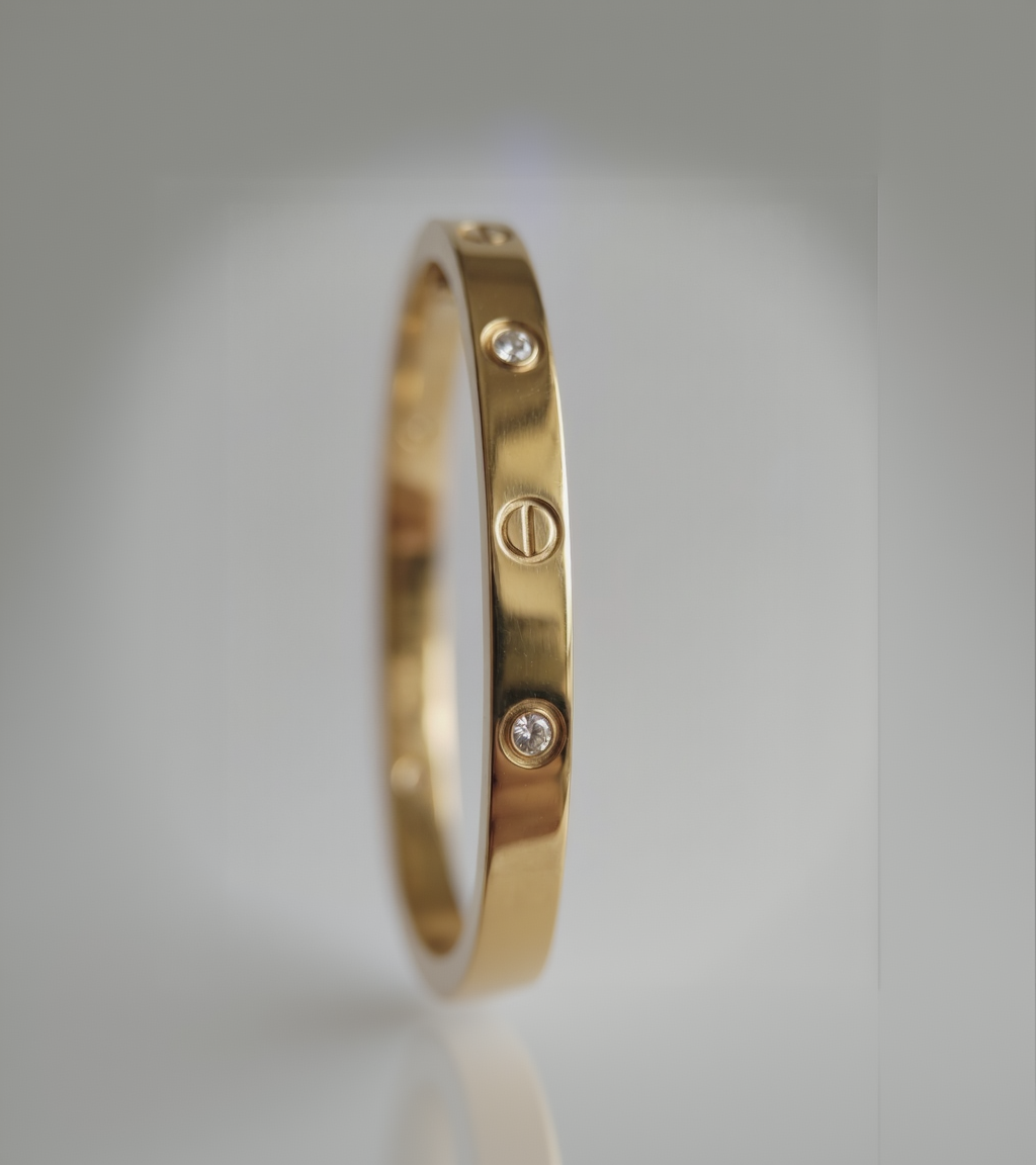 Iconic Gold Bangle with Screw Motifs and Bezel-Set White Stones - SwarnaSage Exclusive