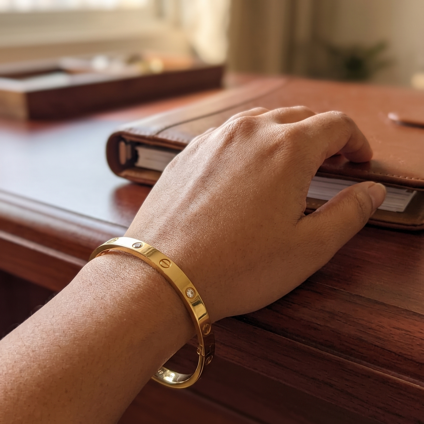 Iconic Gold Bangle with Screw Motifs and Bezel-Set White Stones - SwarnaSage Exclusive