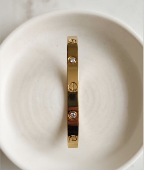 Iconic Gold Bangle with Screw Motifs and Bezel-Set White Stones - SwarnaSage Exclusive